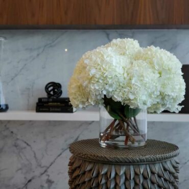 White Hydrangea Bouquet in clear glass cylinder vase