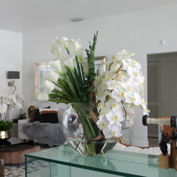 Lunar vase with a mixed bouquet of flowers.