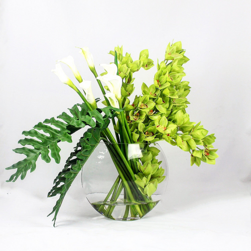 Lunar Vase with green Cymbidium orchids and Calla lilies.