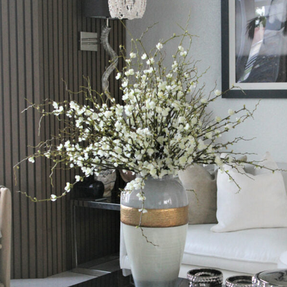 Goddess Vase with Cherry Blossom Branches.