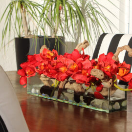 24″ Casa Moderna glass plate planter with red Cymbidiums